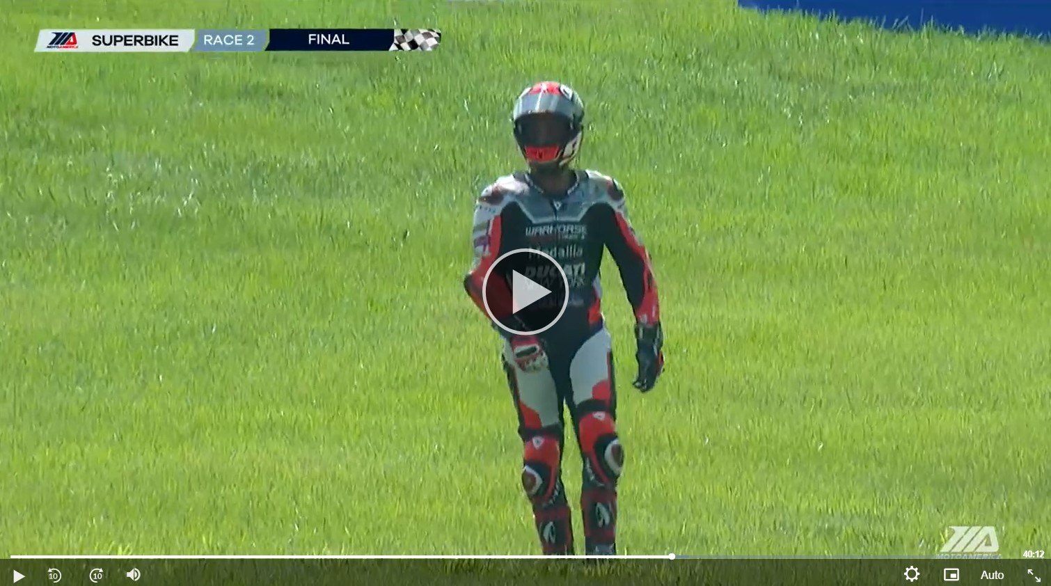 Danilo Petrucci standing and walking under his own power less than 56 seconds after he crashed at the end of MotoAmerica Medallia Superbike Race Two at VIR. Video still image courtesy MotoAmerica Live+.