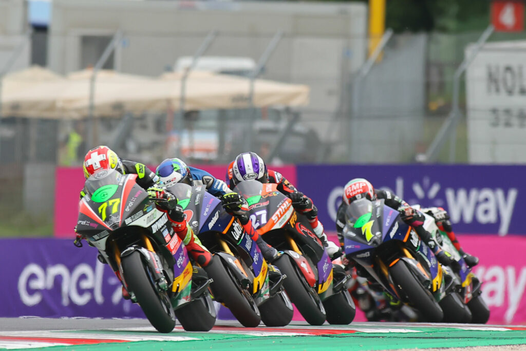 Dominique Aegerter (77) leads the field during MotoE Race One at Mugello. Photo courtesy Dorna.