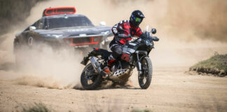 MotoAmerica Superbike racer Danilo Petrucci demonstrates the capabilities of the new Ducati DesertX ahead of an Audi RS Q e-tron prototype rally racer on the Italian island of Sardinia. Photo courtesy Ducati.