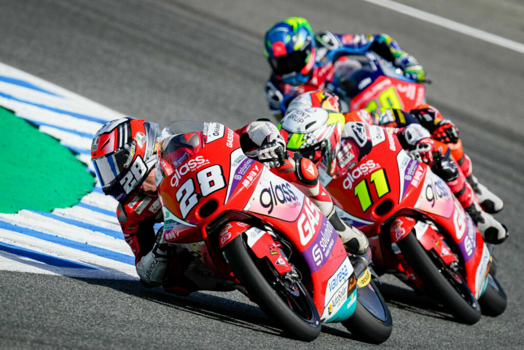 Izan Guevara (28) and Sergio Garcia (11) leading some other Moto3 riders. Photo courtesy Dorna.