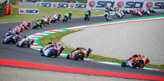 Pedro Acosta (51) and Joe Roberts (16) is sixth early in the Moto2 race at Mugello. Photo by Kohei Hirota.