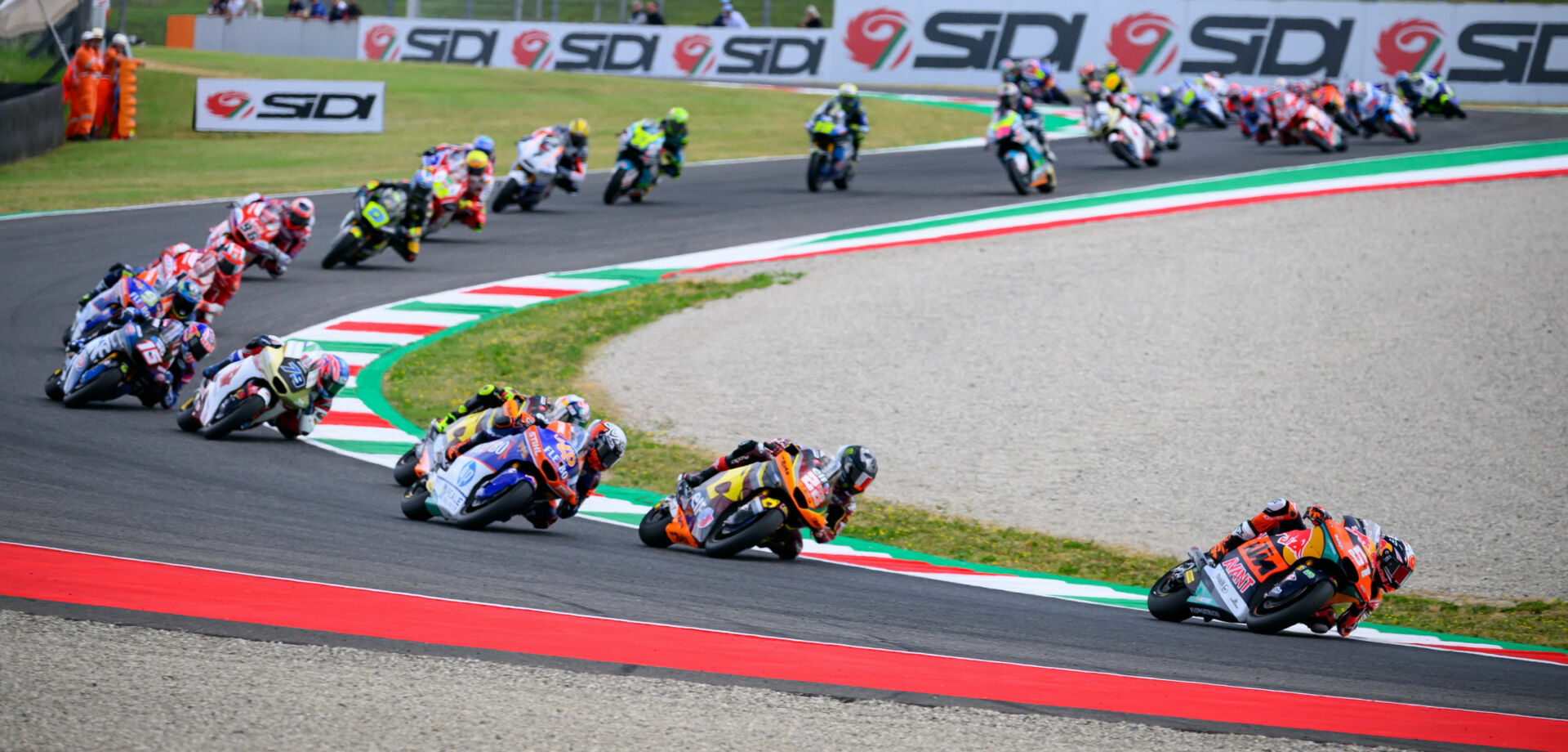 Pedro Acosta (51) and Joe Roberts (16) is sixth early in the Moto2 race at Mugello. Photo by Kohei Hirota.