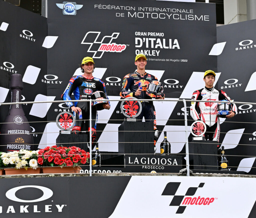 Moto2 race winner Pedro Acosta (center), runner-up Joe Roberts (left), and third-place finisher Ai Ogura (right) on the podium at Mugello. Photo courtesy Dorna.