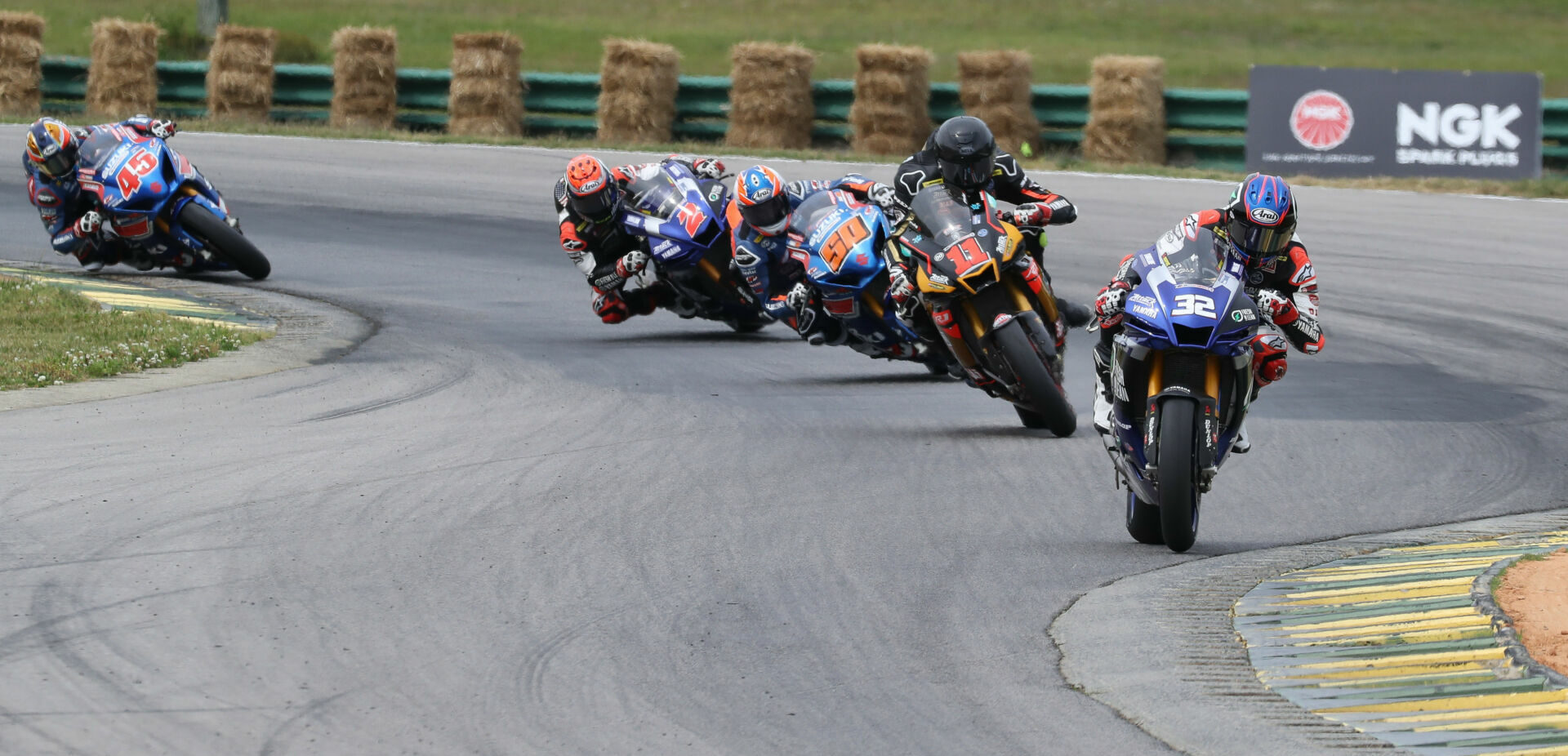 Jake Gagne (32) leads Mathew Scholtz (11), Bobby Fong (50), Josh Herrin (2), and Cameron Petersen (45) during MotoAmerica Superbike Race One at VIR in 2021. Photo by Brian J. Nelson.