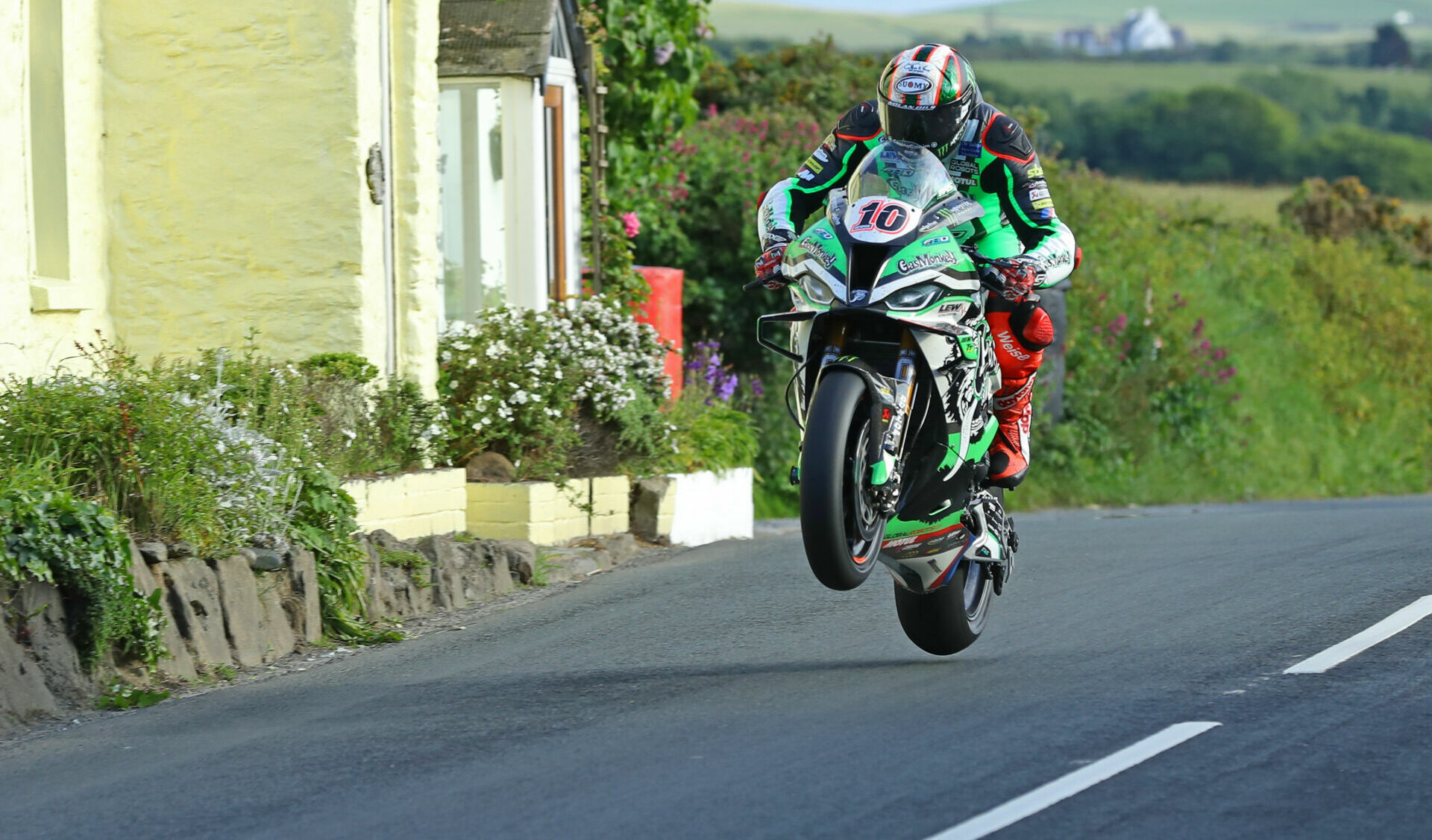 Peter Hickman (10) getting airborne Monday during qualifying at the Isle of Man TT. Photo courtesy Isle of Man TT Press Office.