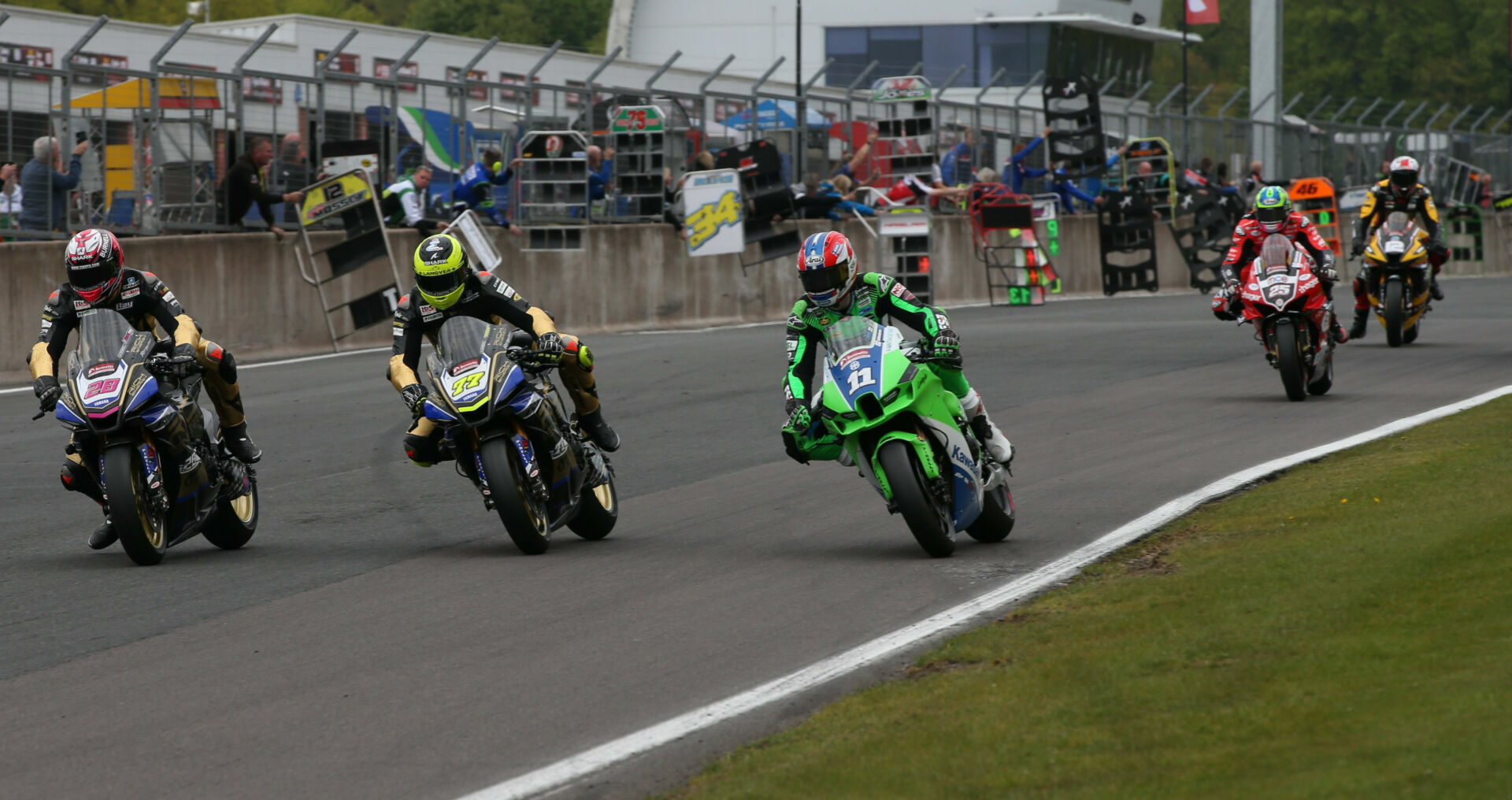 Bradley Ray (28), Kyle Ryde (77), and Rory Skinner (11) battle for the lead at Oulton Park. Photo courtesy MSVR.