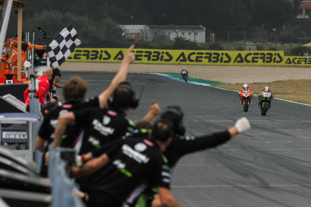 Jonathan Rea (65) leads Alvaro Bautista (19) and Toprak Razgatlioglu (1) to the finish line at Estoril. Photo courtesy Dorna WorldSBK Press Office.