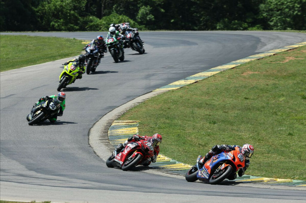 Hayden Gillim (69) leads Geoff May (99), Michael Gilbert (55), and the rest of the field in Yuasa Stock 1000 Race Two at VIR. Gillim captured the win, his second of the weekend. Photo by Brian J. Nelson, courtesy MotoAmerica.