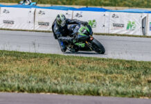 A rider at speed in front of Airfence Bike soft barriers purchased with funds from a previous N2 Track Days fundraiser for the Roadracing World Action Fund. Photo by Apex Pro Photo, courtesy N2 Track Days.