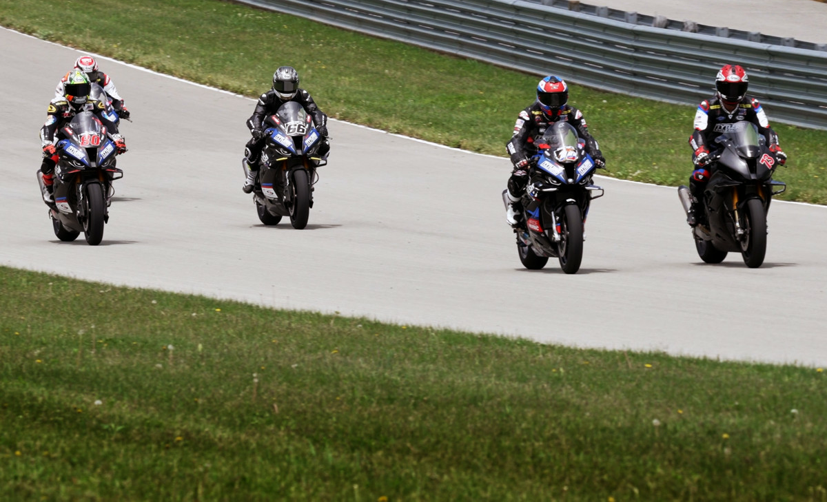 Tytlers Cycle Racing's Larry Pegram (73) during testing with Travis Wyman (10), PJ Jacobsen (66), and Hector Barbera (80) at Pittsburgh International Race Complex. Photo courtesy Tytlers Cycle Racing.