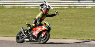 Michael Leon (74) celebrating his victory at Calabogie Motorsports Park. Photo by Colin Fraser, courtesy PMP.