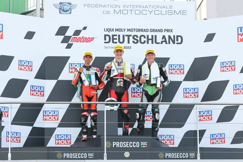 American-born Rossi Moor (center) on top of the Northern Talent Cup podium at Sachsenring with Race One runner-up Kevin Farkas (left) and third-place finisher Dustin Schneider (right). Photo courtesy Dorna.