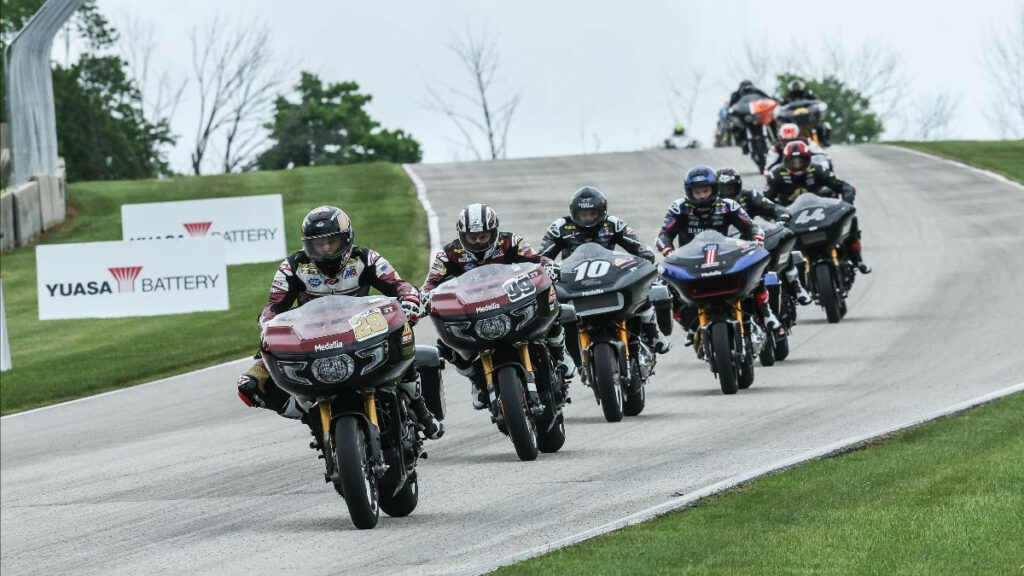 Tyler O'Hara (29) and Jeremy McWilliams (99) lead Mission King Of The Baggers winner Travis Wyman (10) and runner-up Kyle Wyman (1). Photo by Brian J. Nelson, courtesy MotoAmerica.