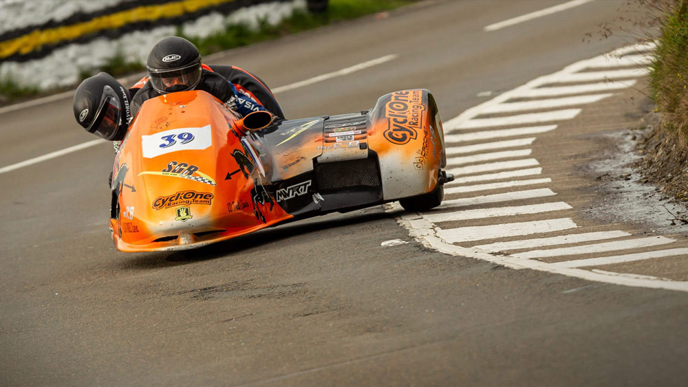 Sidecar pilot César Chanel (39), was killed Saturday, June 4 at the Isle of Man TT. Passenger Olivier Lavorel, who was originally reported deceased, suffered severe injuries but is still alive. Photo courtesy Isle of Man TT Press Office.