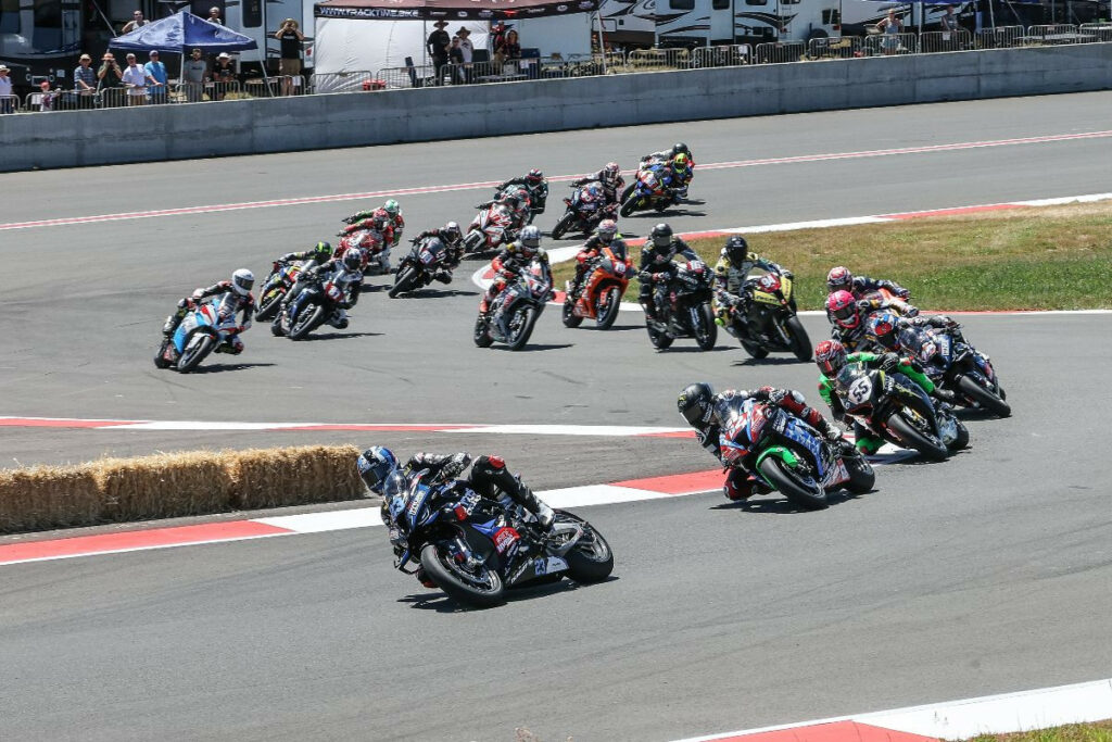 Corey Alexander (23) leads Andy DiBrino (62), Michael Gilbert (55) and the rest of the Yuasa Stock 1000 class on Saturday at Ridge Motorsports Park. Photo by Brian J. Nelson, courtesy MotoAmerica.