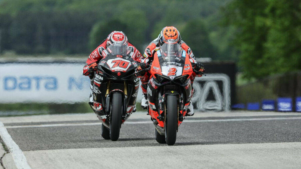 Tyler Scott (70) drafted past Josh Herrin (2) at the finish line to win the Supersport race on Saturday at Road America. Photo by Brian J. Nelson, courtesy MotoAmerica.