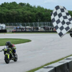 Kensei Matsudaira (1) and Mac MacClugage (3) raced to the line in both 160cc classes during MotoAmerica Mini Cup by Motul races on Saturday evening at Road America. The two split wins in the pair of races. Photo by Brian J. Nelson, courtesy MotoAmerica.