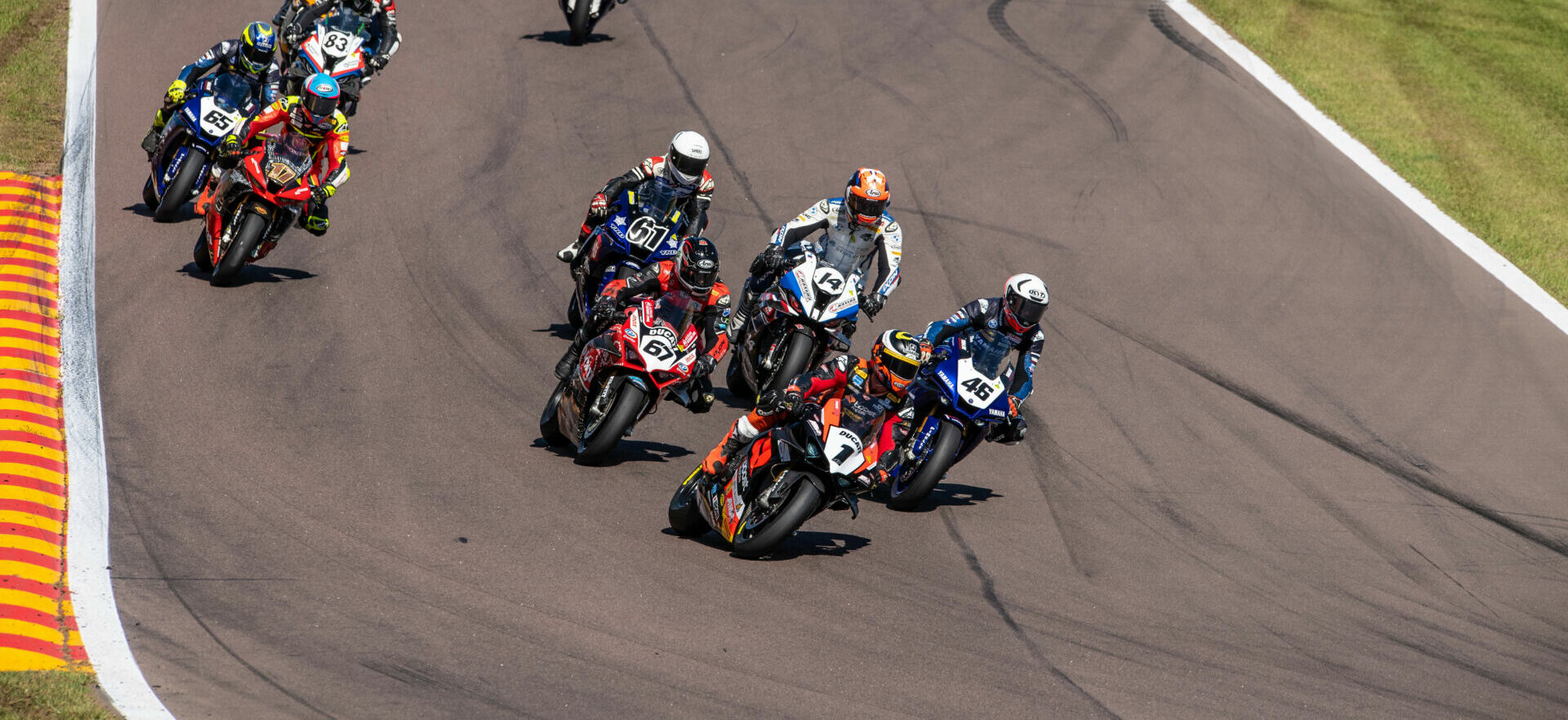 Action from an Australian Superbike race Sunday at Hidden Valley Raceway. Photo by Karl Phillipson @optikalphoto, courtesy ASBK.