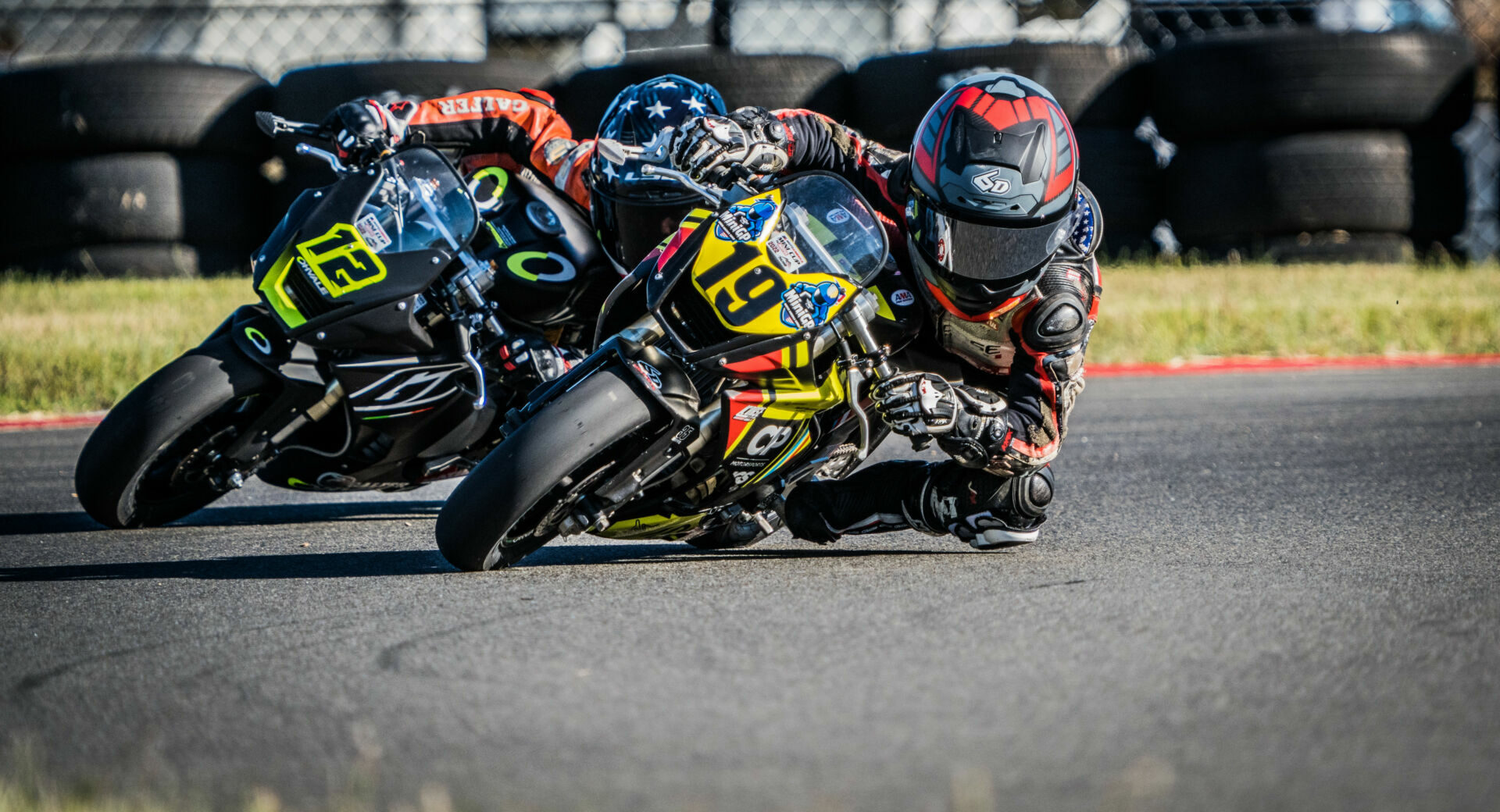 Nathan Gouker (19) and Anthony Lupo Jr. (12) battling for position on the kart track at Ridge Motorsports Park. Photo by Dustin Ishikura/Fast Glass Media.