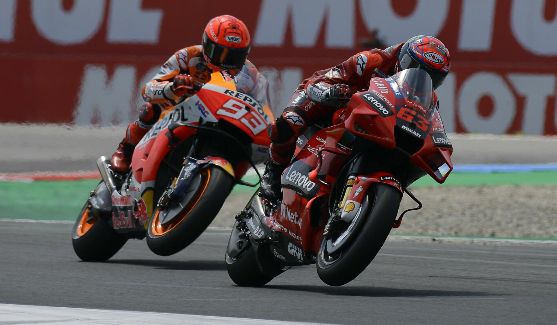 Francesco Bagnaia (63) leading Marc Marquez (93) at Assen in 2021. Photo courtesy Dorna.