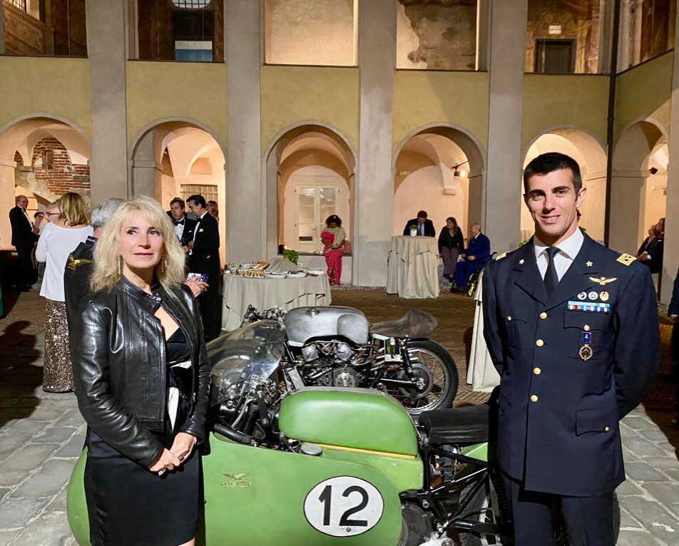 Elena Bagnasco, granddaughter of Moto Guzzi co-founder Giorgio Parodi, with Colonello Stefano Vit, Comandante delle Frecce Tricolori. Photo courtesy Elena Bagnasco.