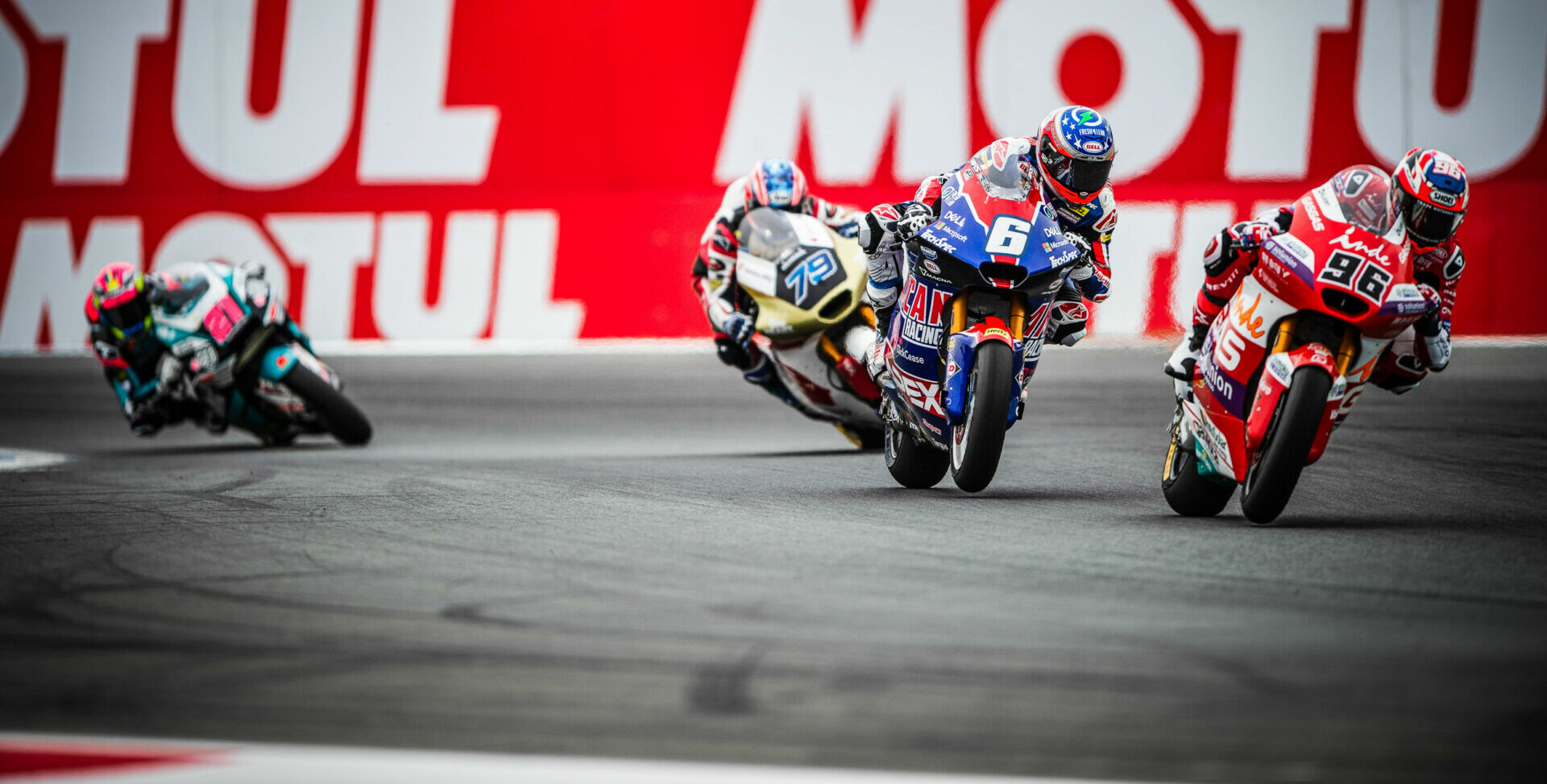 American Cameron Beaubier (6) charged from 18th on the grid to fight with podium finishers Jake Dixon (96) and Ai Ogura (79), before crashing out in the closing laps of the Moto2 race at Assen. Photo courtesy American Racing Team.
