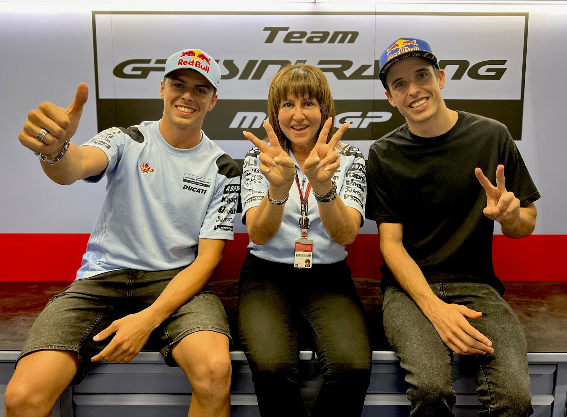 Fabio Di Giannantonio (left) and Alex Marquez (right) with Gresini Racing Team Owner Nadia Padovani Gresini (center). Photo courtesy Gresini Racing.