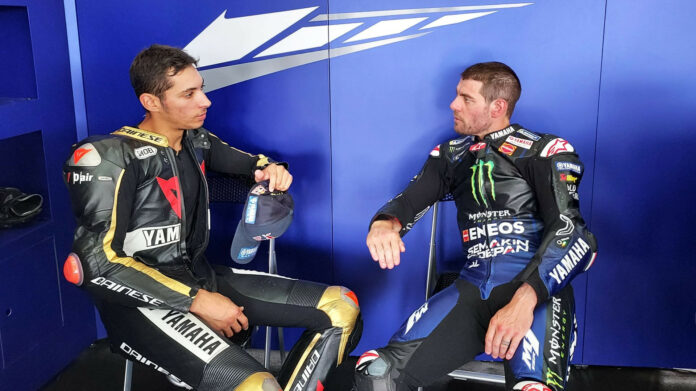 Reigning Superbike World Champion Toprak Razgatlioglu (left) with Yamaha MotoGP test rider Cal Crutchlow (right) in the garage at MotorLand Aragon. Photo courtesy Yamaha.