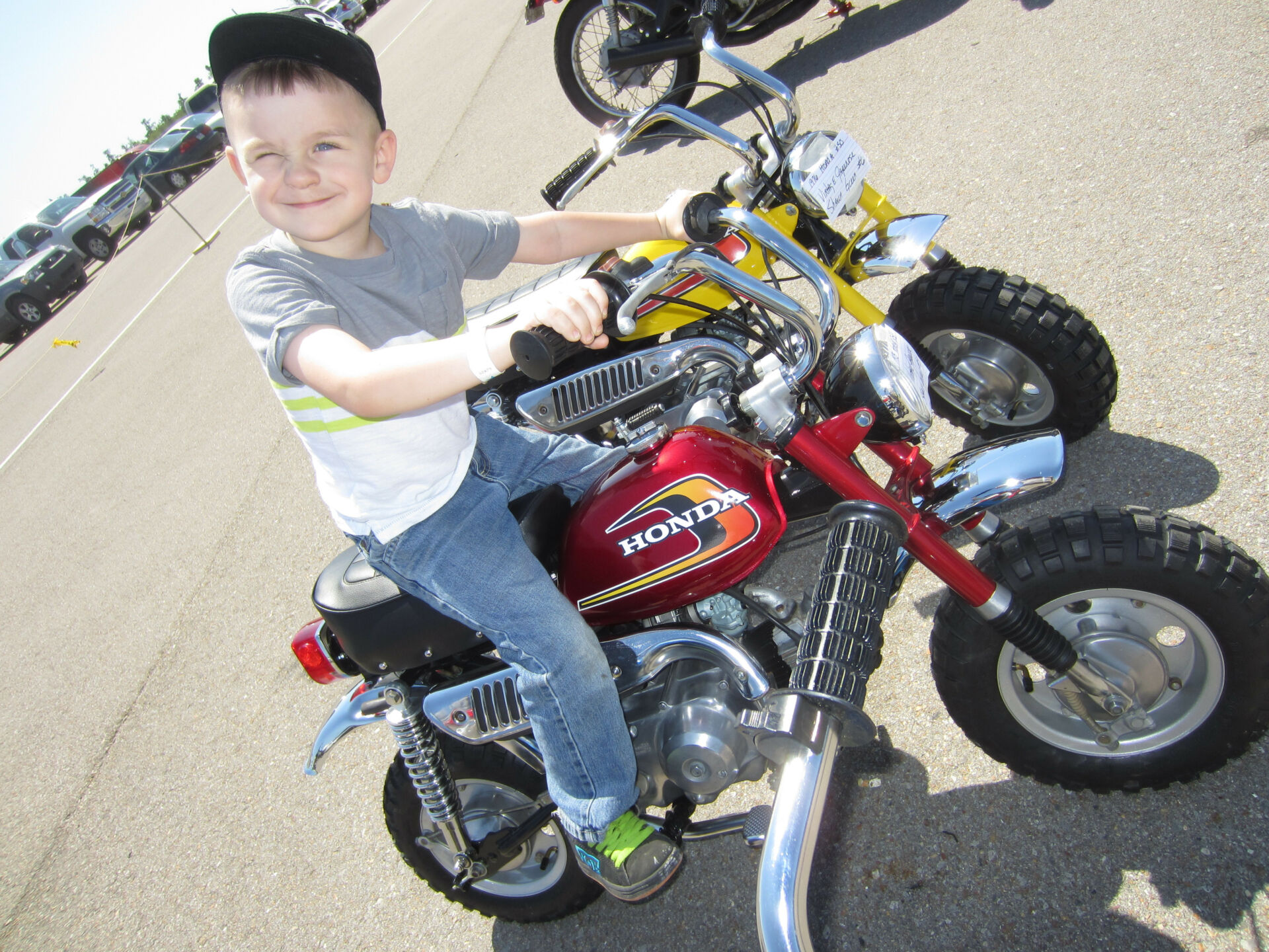 A young motorcycle enthusiast on a vintage Honda minibike. Photo by Maurice Laroque-Turgeau, courtesy AHRMA.