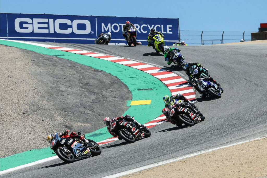 Josh Herrin (2) leads Tyler Scott (70), Cory Ventura (24) and the rest of the Supersport pack through the Corkscrew on Sunday. Photo by Brian J. Nelson.