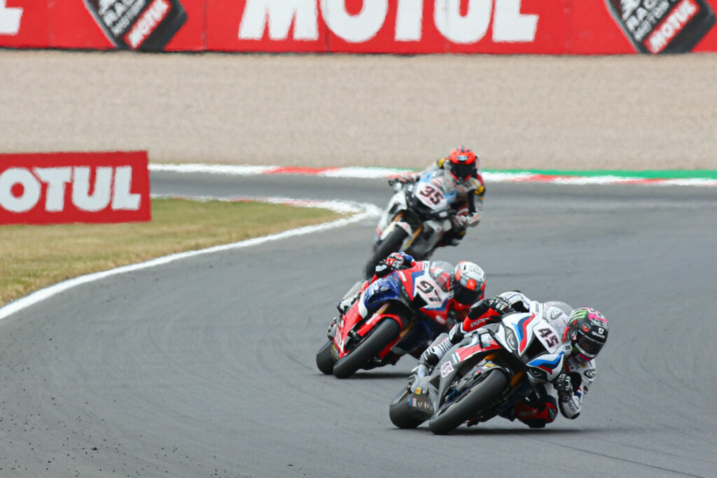 Scott Redding (45) leading Xavi Vierge (97) on track at Donington Park. Photo courtesy Dorna.