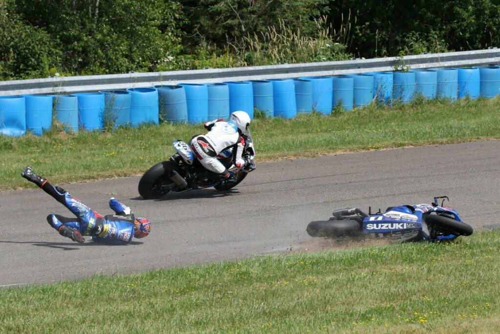Alex Dumas crashed out of the lead at the top of AMP's famed Rollercoaster leading onto the back stretch. Ben Young (86) squeezed by to take the lead and the win. Photo by Rob O'Brien, courtesy CSBK/PMP.
