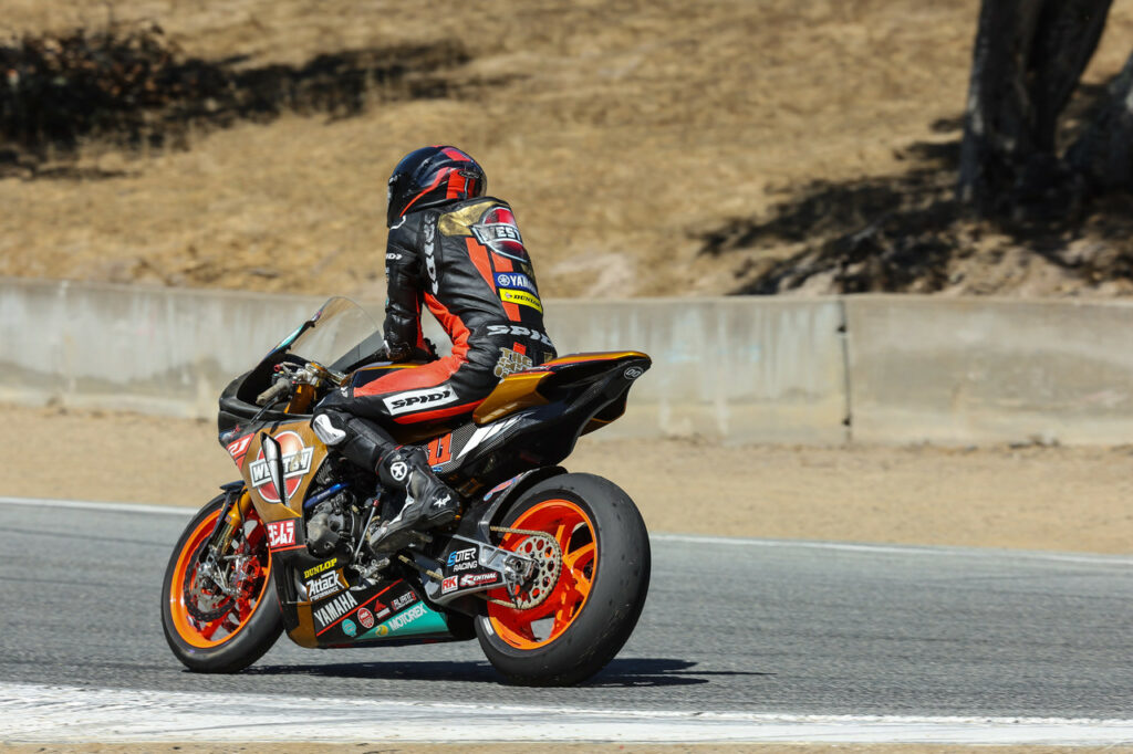 Mathew Scholtz (11) cruising to the pits after crashing his Westby Racing Yamaha in Superbike Race Two. He was uninjured. Photo by Brian J. Nelson, courtesy Westby Racing.