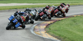 The Mission King Of The Baggers (KOTB) series is back in action this weekend at WeatherTech Raceway Laguna Seca as part of the GEICO Motorcycle MotoAmerica Superbike Speedfest At Monterey. Here, Tyler O'Hara (29) is seen leading Jeremy McWilliams (99), Travis Wyman (10), and Kyle Wyman (1) during the KOTB race at Road America. Photo by Brian J. Nelson.