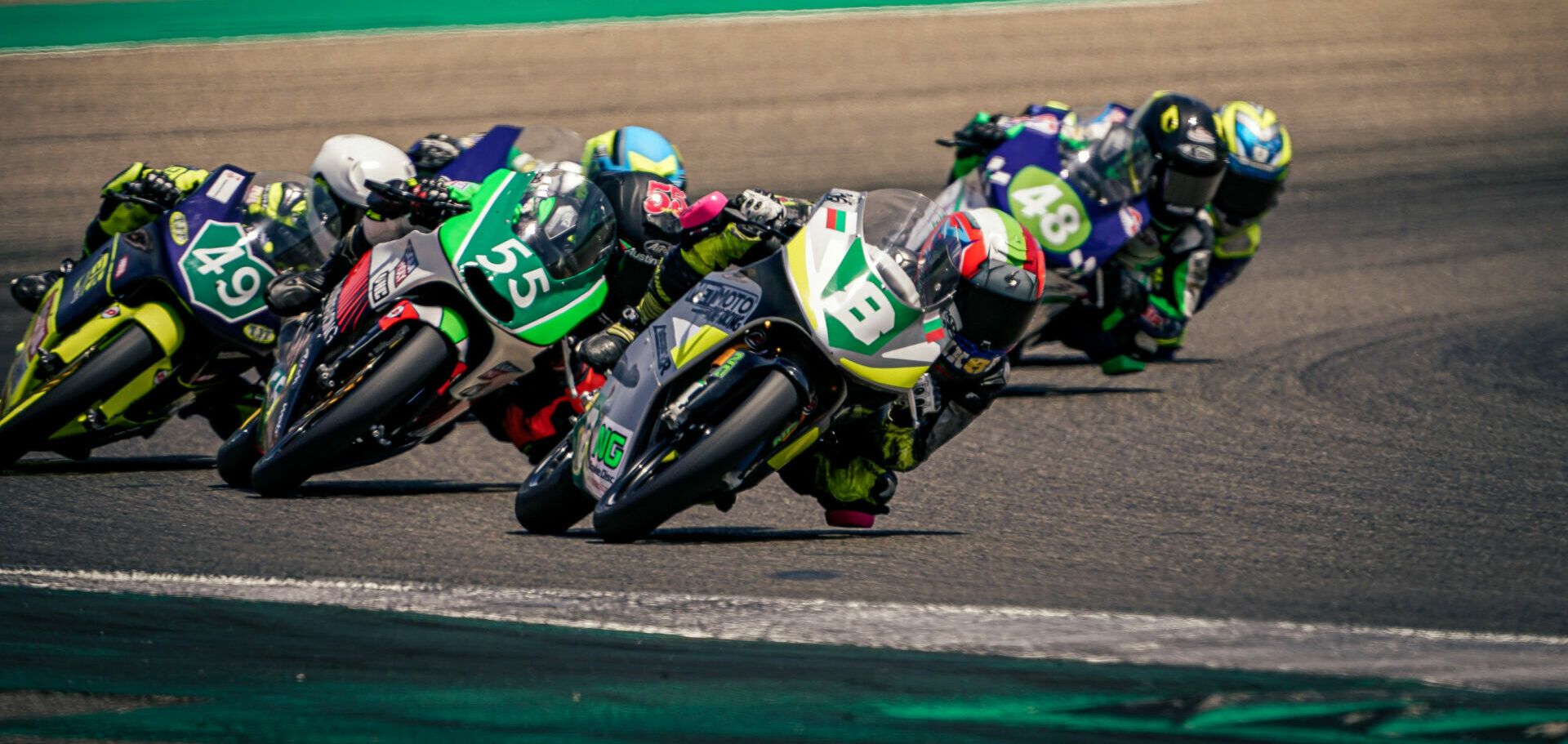 American Mikey Lou Sanchez (55) runs second behind Nikola Miroslavov (8) in ESBK Moto4 Race One at MotorLand Aragon. Photo courtesy Sanchez Racing.American Mikey Lou Sanchez (55) runs second behind Nikola Miroslavov (8) in ESBK Moto4 Race One at MotorLand Aragon. Photo courtesy Sanchez Racing.