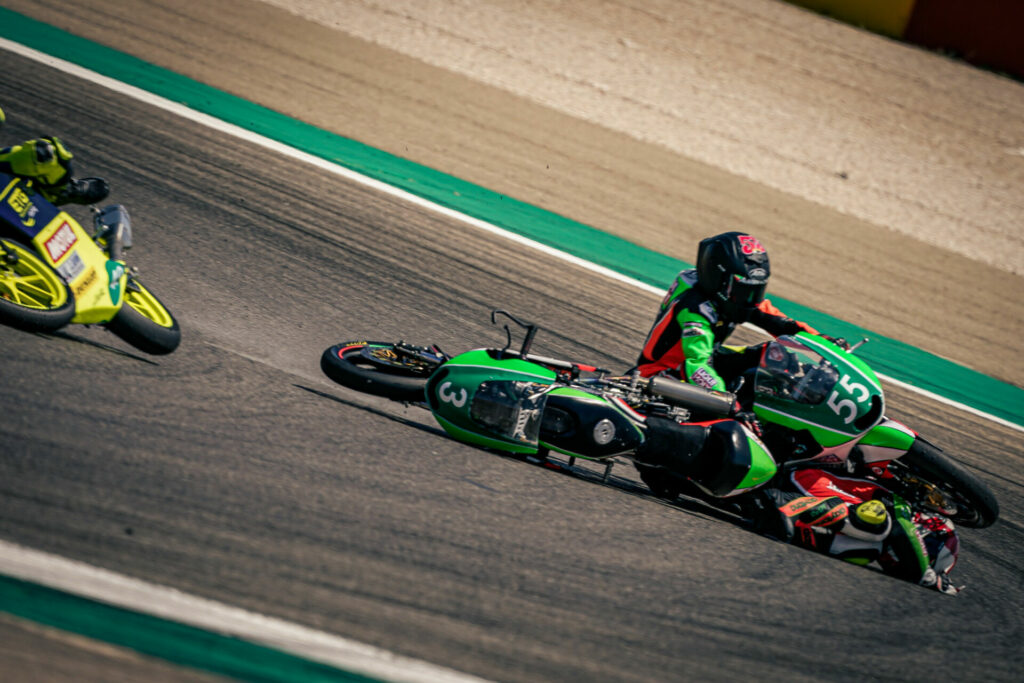 Mikey Lou Sanchez (55) crashes along with Archie Gibbs (3) during Moto4 Race Two at MotorLand Aragon. Photo courtesy Sanchez Racing.