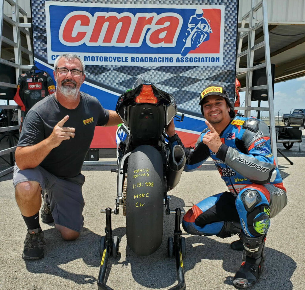 JC Camacho (right) with John Hutchinson of Pirelli's trackside racing tire vendor South Central Race Center. Photo courtesy Pirelli.
