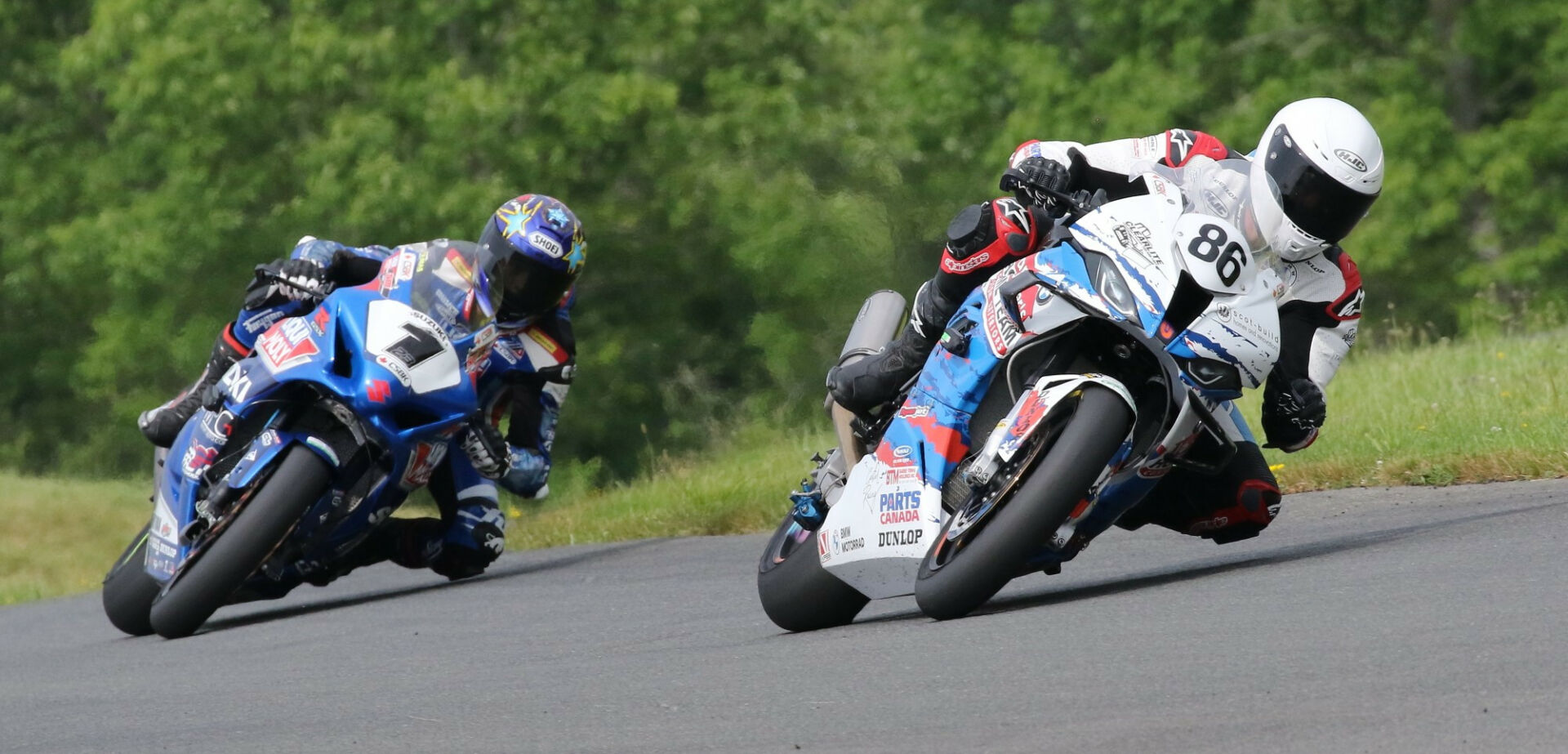 Ben Young (86) on his way to victory in the final laps of Canadian Superbike Race Two at Atlantic Motorsport Park. Young and Alex Dumas (1) exchanged the lead multiple times through the very hot 22-lap feature race. Photo by Rob O'Brien, courtesy CSBK/PMP.