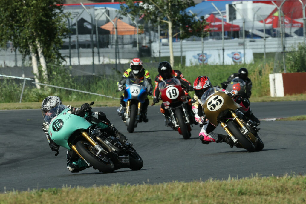 Kayleigh Buyck (16) won the Royal Enfield Build. Train. Race. battle with Chloe Peterson (55) on Saturday at BIR. Photo by Brian J. Nelson, courtesy MotoAmerica.