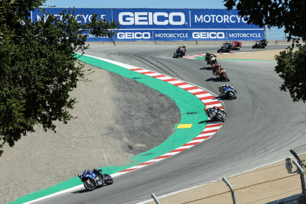 Jake Gagne (1) leads the field down the Corkscrew at WeatherTech Raceway Laguna Seca. The new championship point leader was never headed in leading the race from start to finish. Photo by Brian J. Nelson.