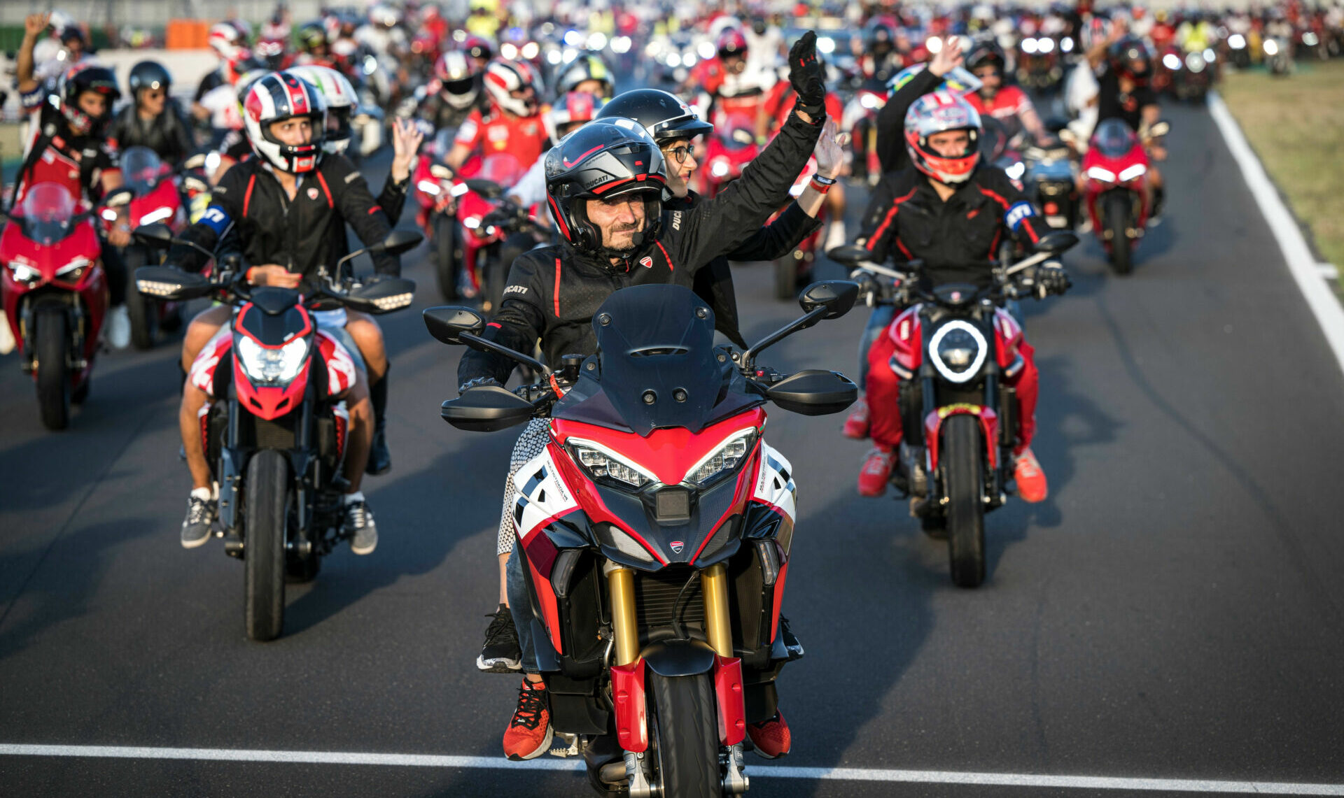 Ducati CEO Claudio Domenicali leads a parade of Ducatisti Friday, July 22 at Misano. Photo courtesy Ducati.