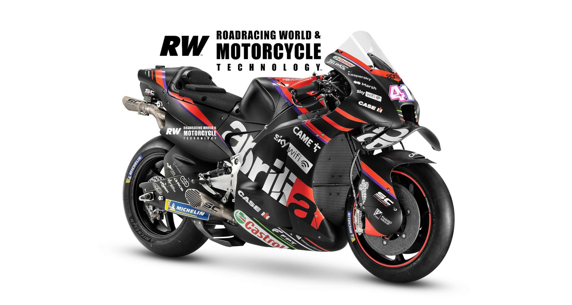 The 90-degree V4 Aprilia RS-GP as ridden by Aleix Espargaró (41), who took Aprilia's first MotoGP win. Note aerodynamics: Multi-element wings, fender extending over fork legs, air-gap between front wheel and fairing, and rear wheel airflow device and shielding. Photo courtesy Aprilia.