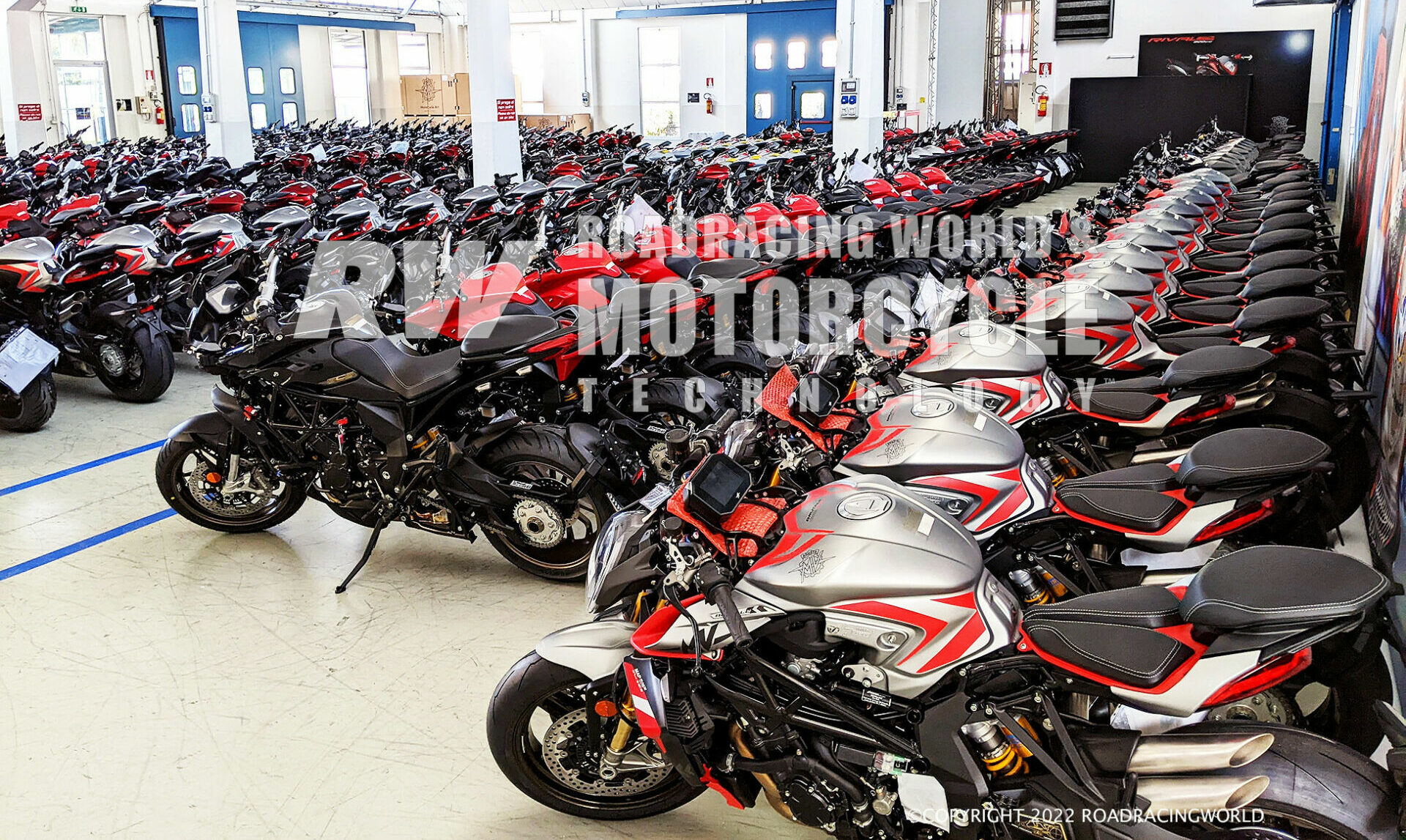 Each MV model has various sub-specifications for specific markets based on regulations for lighting, sound, and emissions. These bikes are already sold and waiting to be crated up and shipped to their final destinations. Photo by Melissa Berkoff.