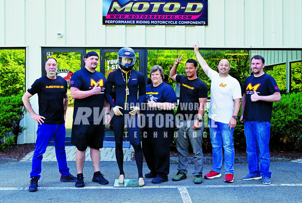 Scott Diamond (second from right) with his staffers and an inner-suit-wearing mannequin at Moto-D headquarters in Bethel, Connecticut. From left, Matt, Big Jimmy, the display mannequin, Terri, Julian, Scott, and Nick.