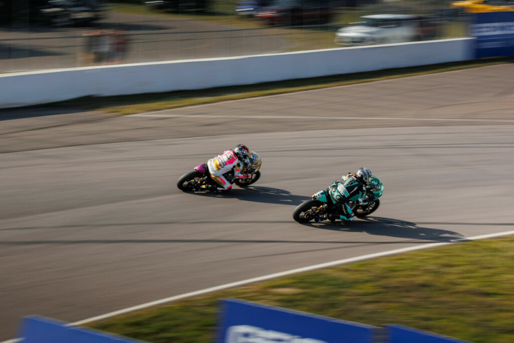 Chloe Petersen (55) and Kayleigh Buyck (16) battled for the MotoAmerica Royal Enfield Build. Train. Race. (BTR) race lead at Brainerd International Raceway. Photo courtesy Royal Enfield North America.