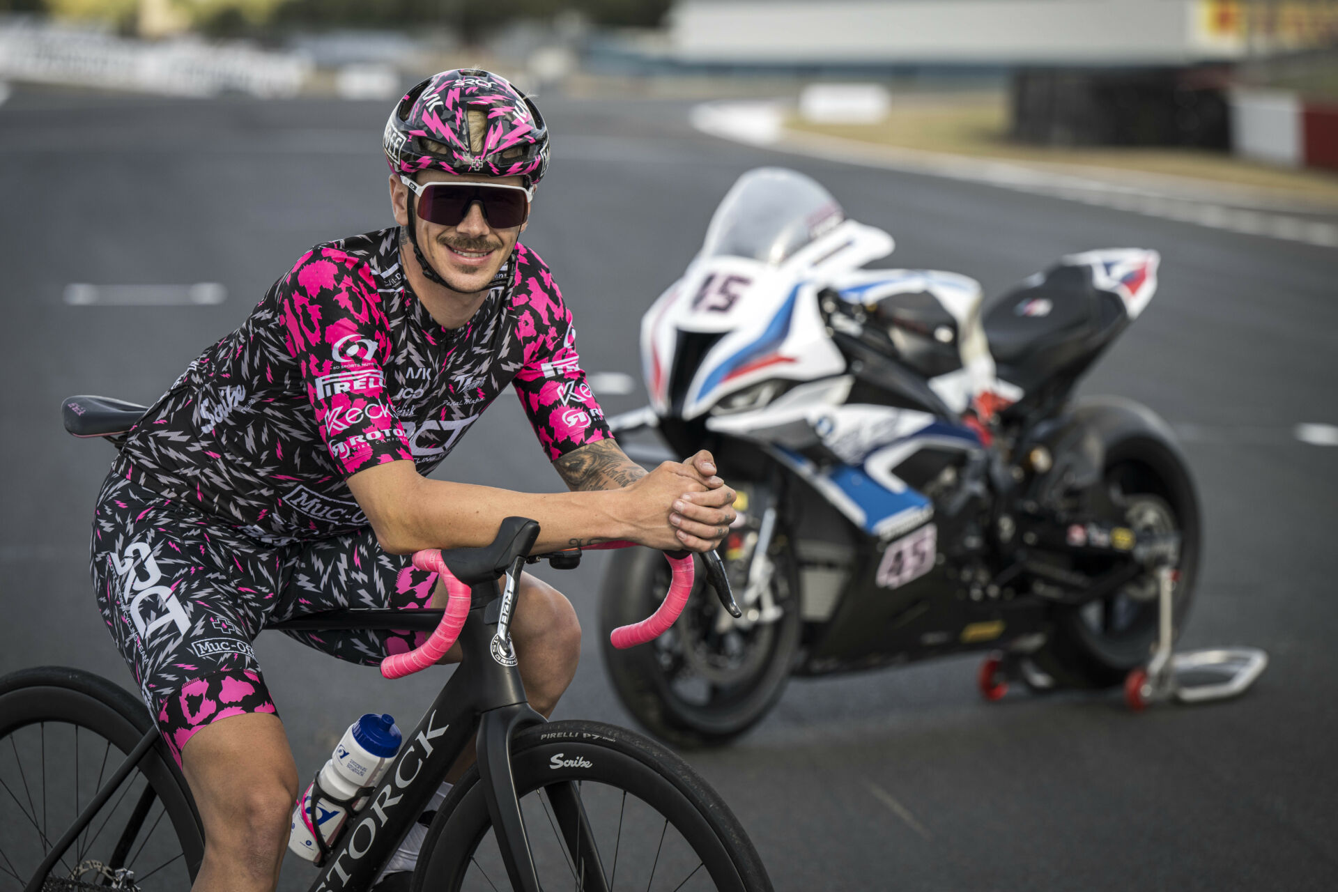 Scott Redding in his cycling gear with his BMW Motorrad Motorsport M 1000 RR World Superbike. Photo courtesy BMW Motorrad Motorsport.