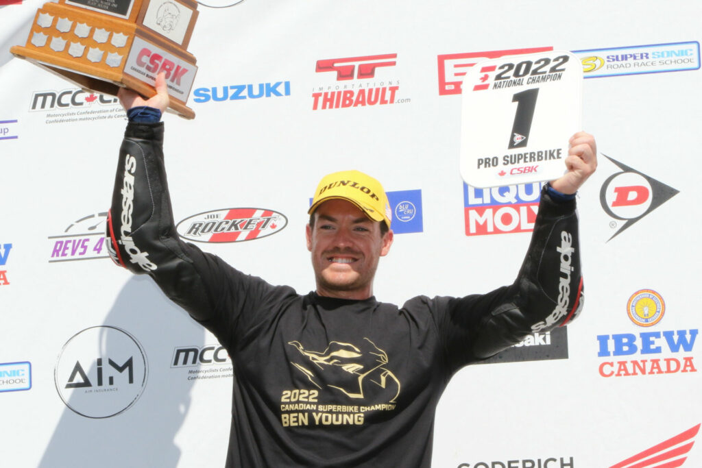 Ben Young hoists the CSBK number one plate after clinching the 2022 Superbike championship with one race to go. Photo by Rob O'Brien, courtesy CSBK/PMP.