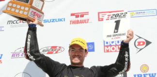 Ben Young hoists the CSBK number one plate after clinching the 2022 Superbike championship with one race to go. Photo by Rob O'Brien, courtesy CSBK/PMP.