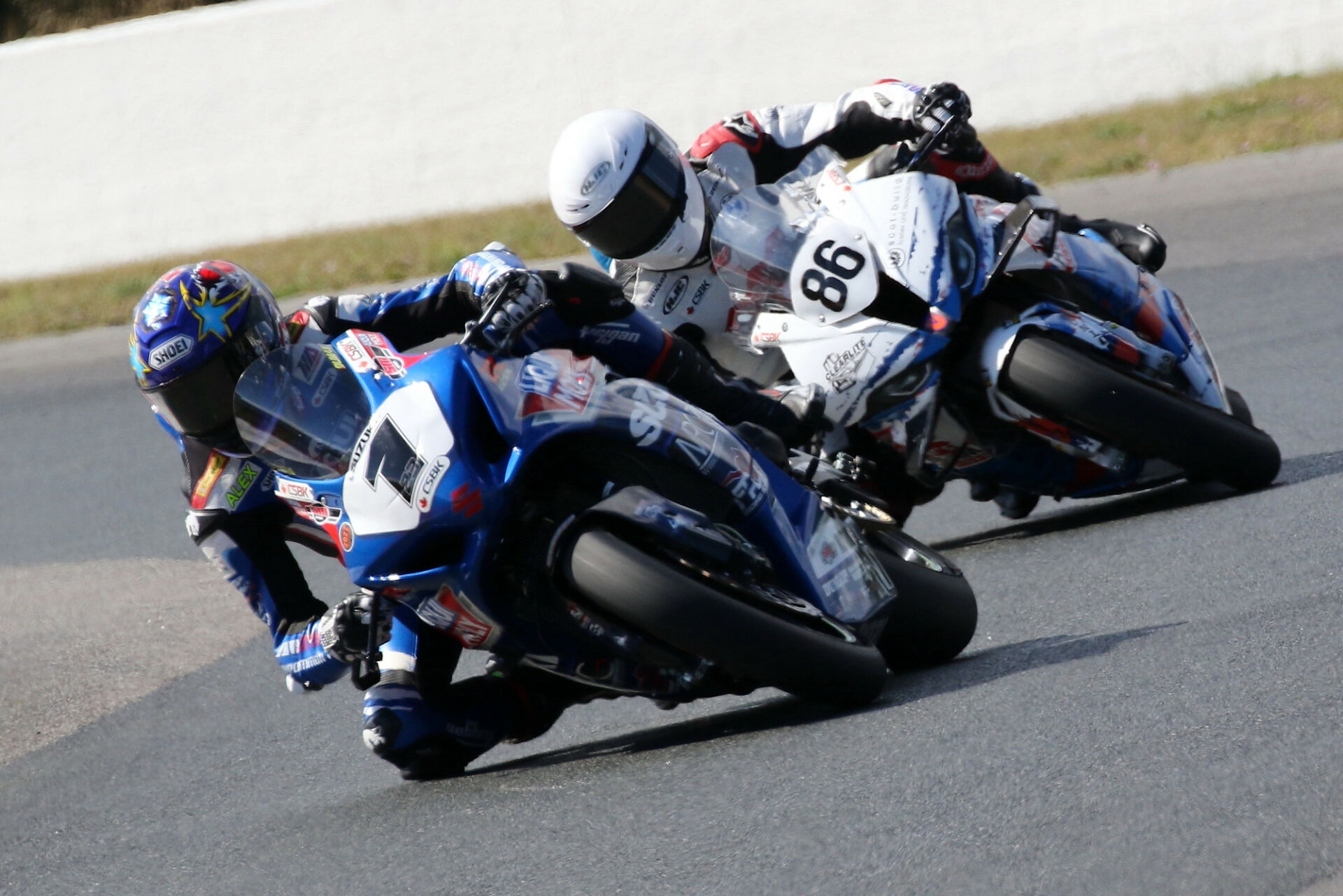 Alex Dumas (1) leads newly crowned CSBK Superbike champion Ben Young (86) in Sunday's shortened Superbike Race Three of the season finale weekend at CTMP. Photo by Rob O'Brien, courtesy CSBK/PMP.