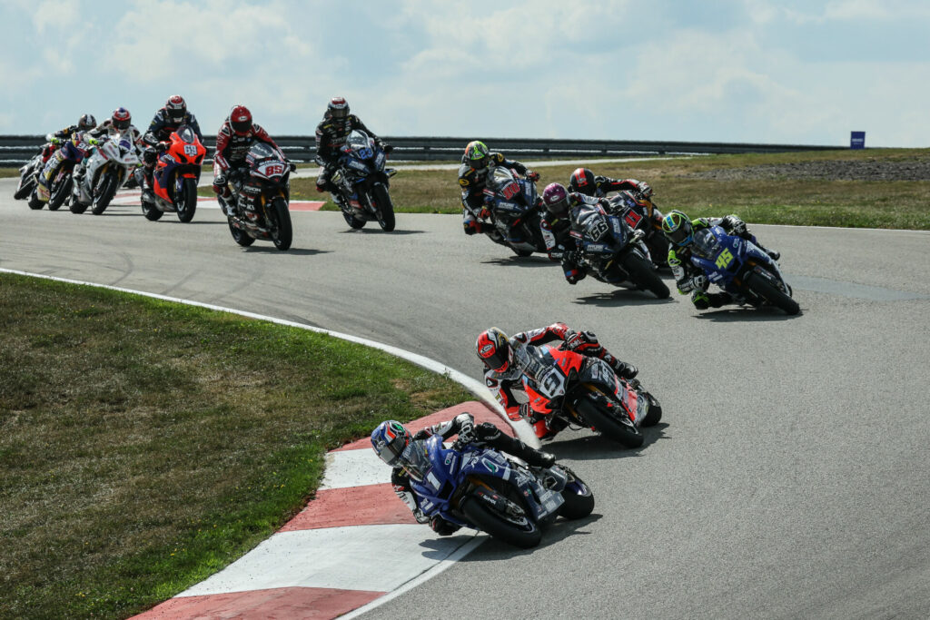 Jake Gagne (1) leads Danilo Petrucci (9) early in one of the three starts during MotoAmerica Superbike Race One Saturday at PittRace. Photo by Brian J. Nelson, courtesy MotoAmerica.